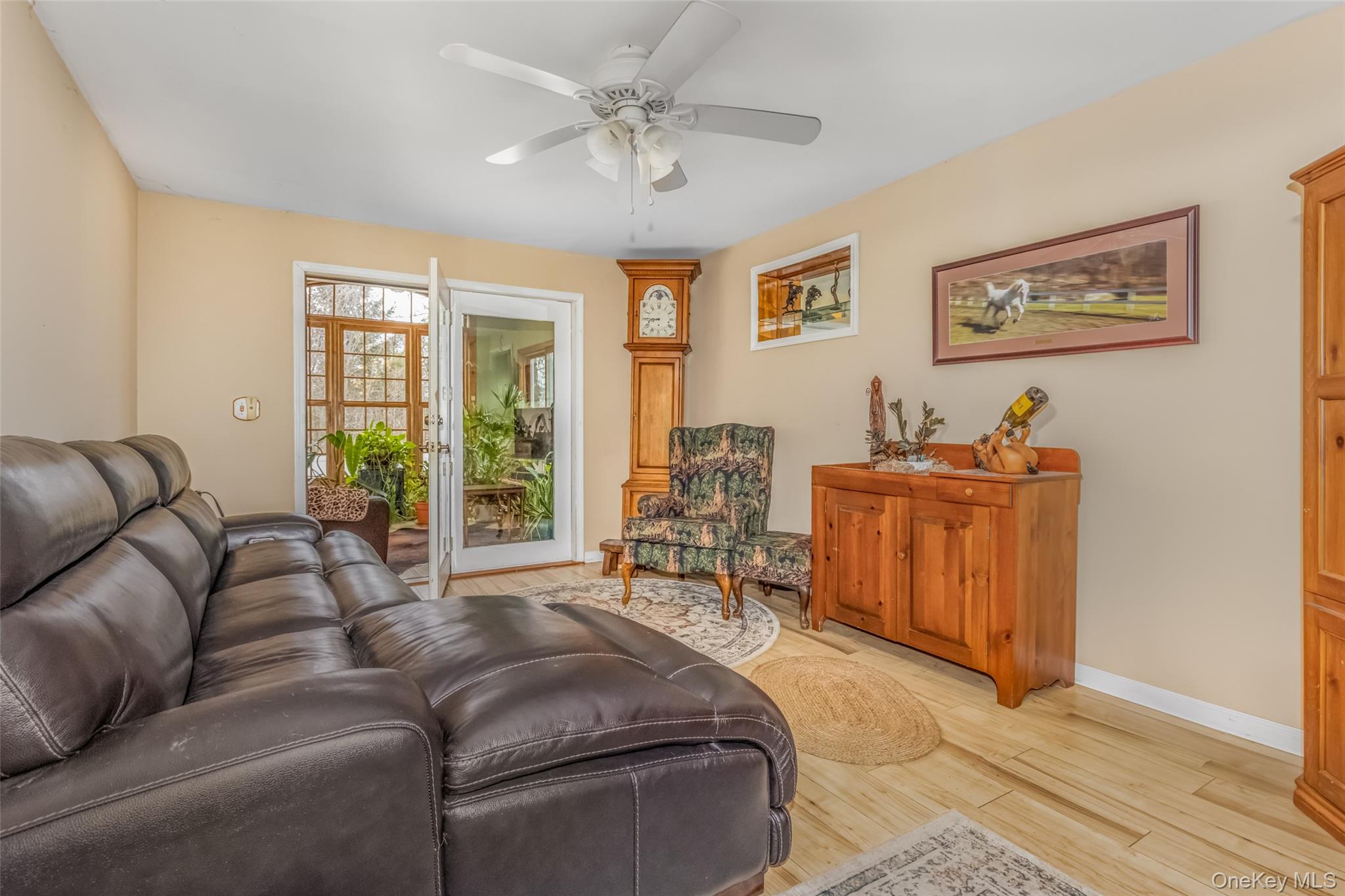 1896 Rte 44 55 Modena, NY 12548 - Photo 29 of 48 Living area featuring light wood-type flooring and a ceiling fan