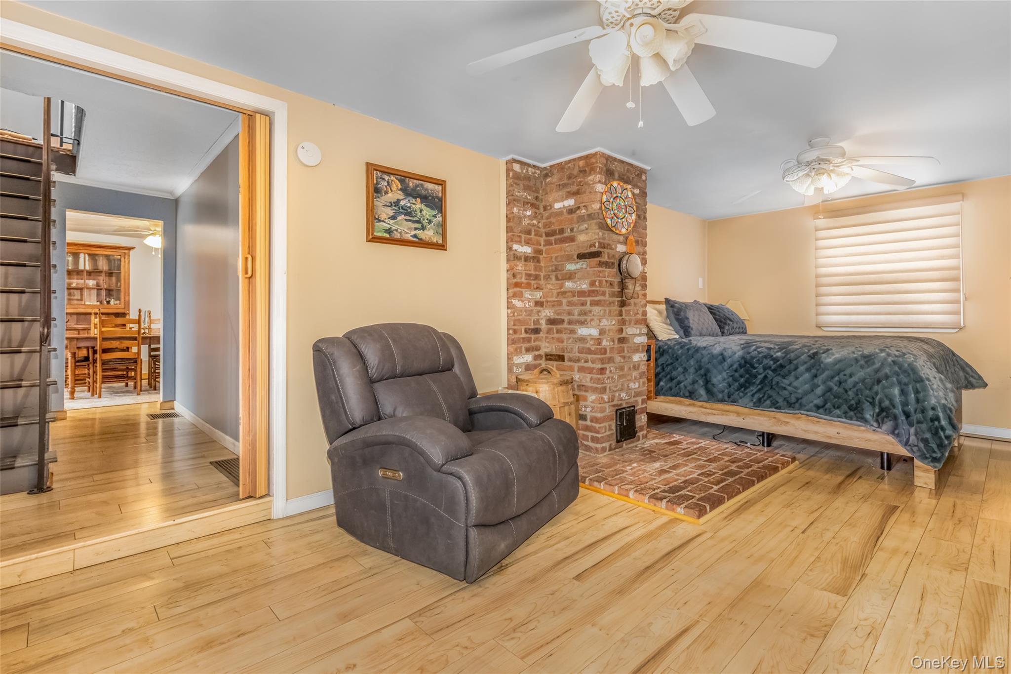 1896 Rte 44 55 Modena, NY 12548 - Photo 32 of 48 Bedroom featuring wood finished floors and ceiling fan
