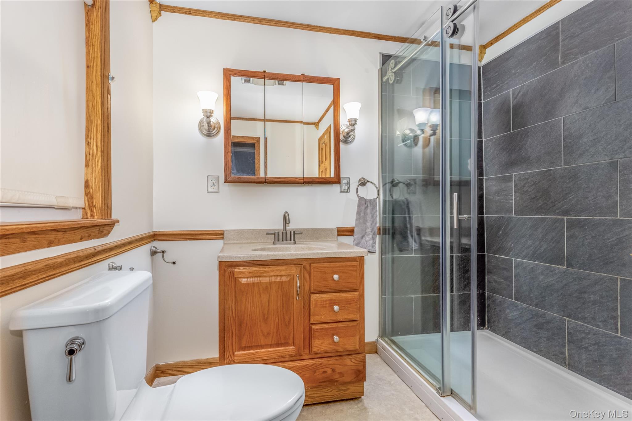 1896 Rte 44 55 Modena, NY 12548 - Photo 35 of 48 Full bathroom featuring vanity, a shower stall, and ornamental molding