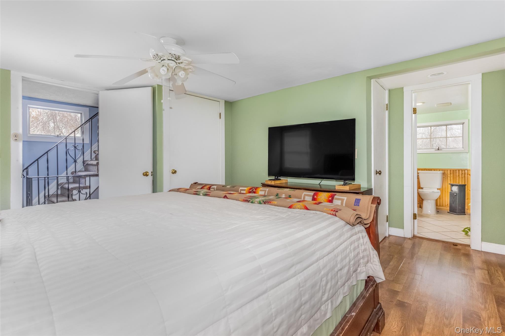 1896 Rte 44 55 Modena, NY 12548 - Photo 39 of 48 Bedroom featuring wood finished floors and ceiling fan