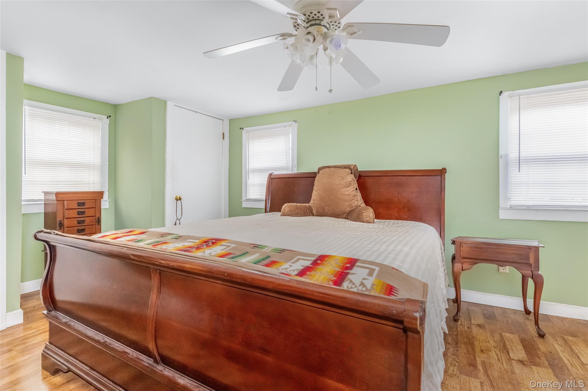 1896 Rte 44 55 Modena, NY 12548 - Photo 41 of 48 Bedroom with light wood-style flooring, multiple windows, and ceiling fan