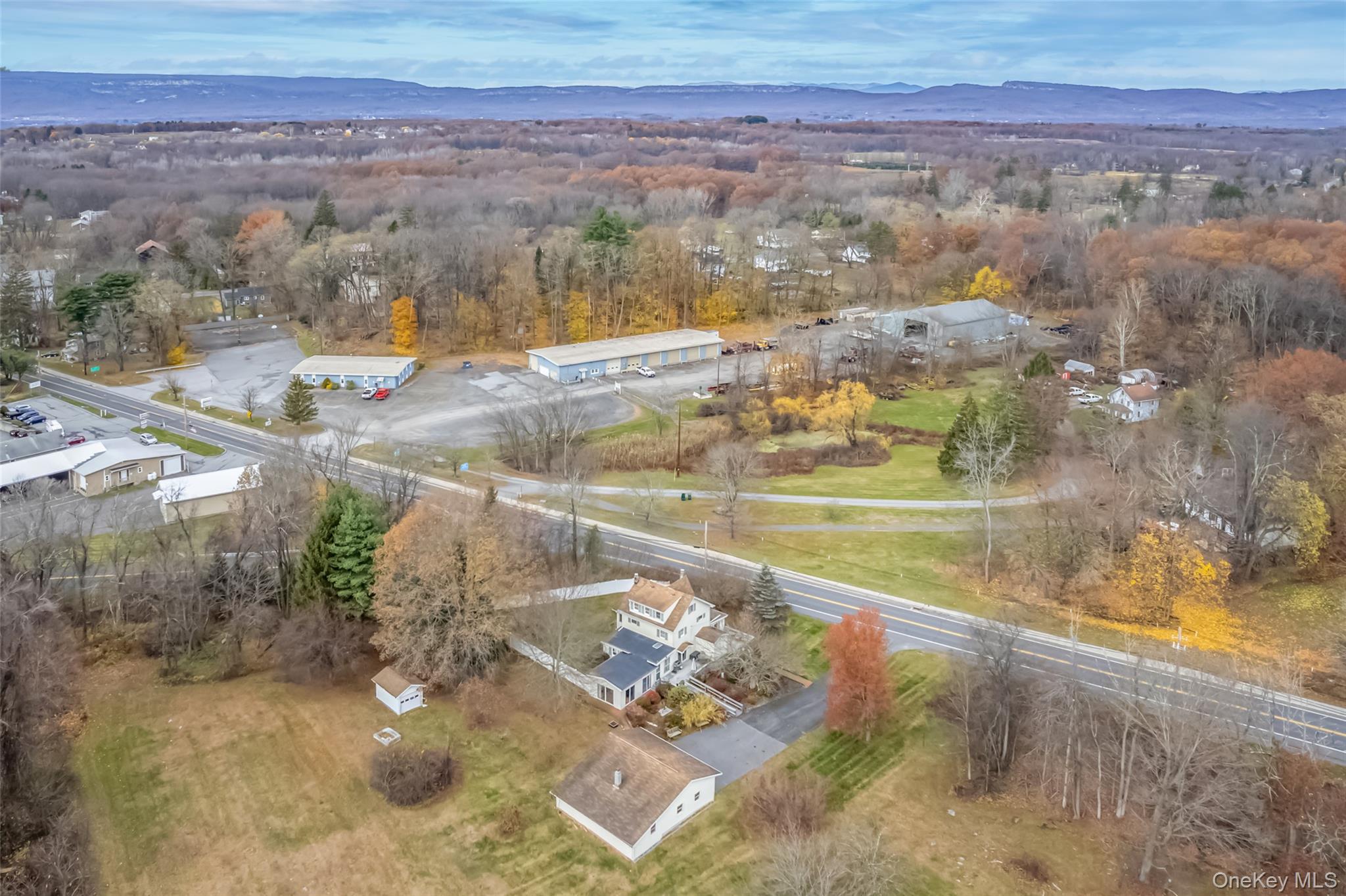 1896 Rte 44 55 Modena, NY 12548 - Photo 6 of 48 Aerial view of property and surrounding area with a mountainous background
