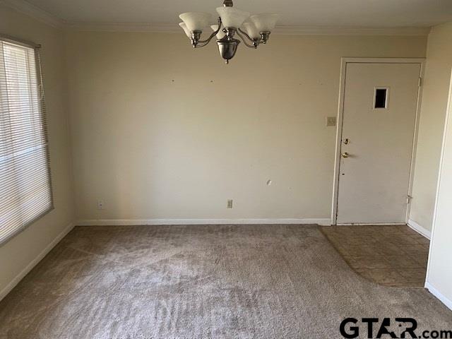 5700 Foxcroft Road Tyler, TX 75703 - Photo 4 of 10 an empty room with windows