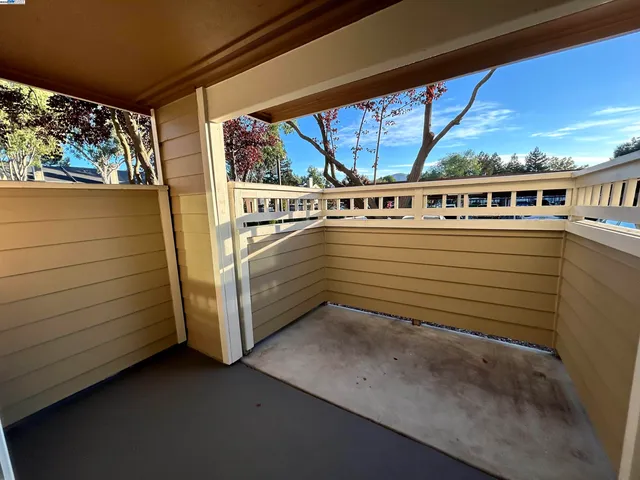 a view of a balcony with an outdoor space