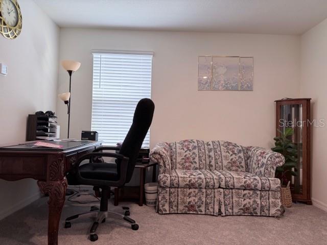 5175 Southwest 47th Lane Gainesville, FL 32608 - Photo 13 of 24 a bedroom with furniture and a window