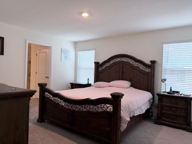 5175 Southwest 47th Lane Gainesville, FL 32608 - Photo 14 of 24 a bedroom with a bed and a dresser