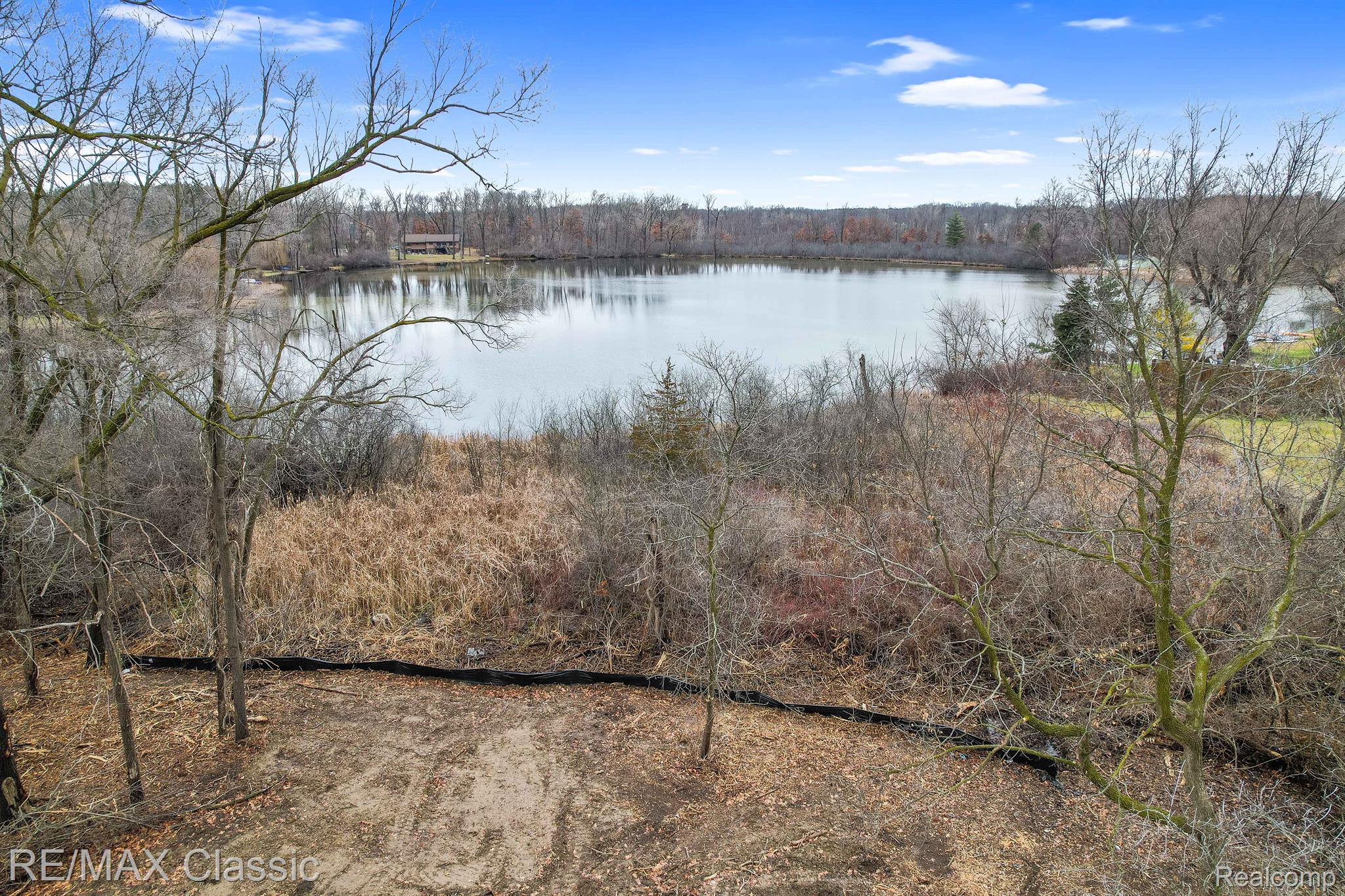 2011 Decker Road Walled Lake, MI 48390 - Photo 35 of 37 Hawk Lake Across the Street