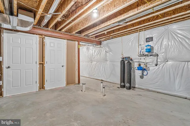 a view of a room with wooden walls