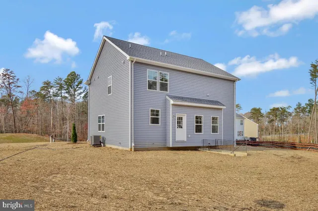 a front view of house with yard