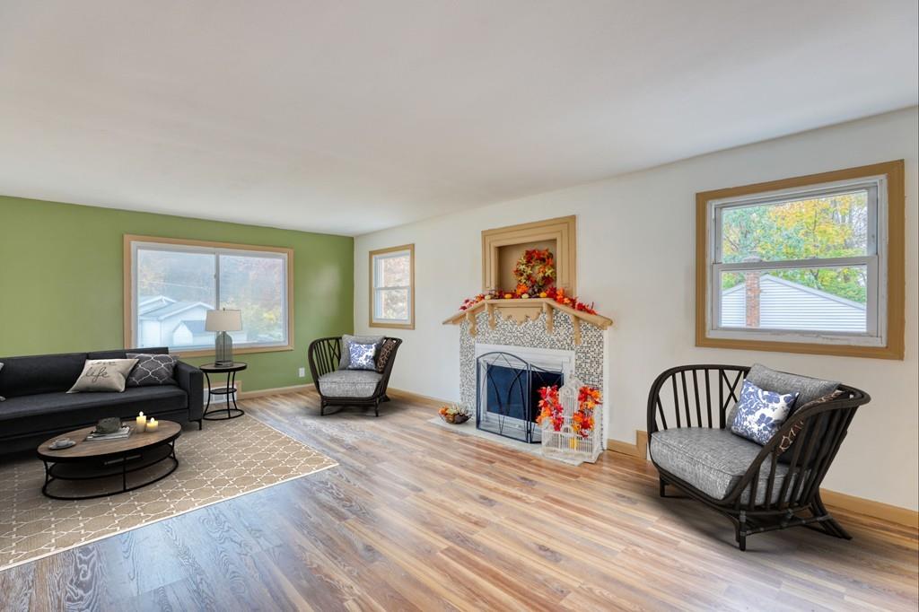 40 Truman Circle Springfield, MA 01109 - Photo 5 of 13 a living room with furniture and a fireplace