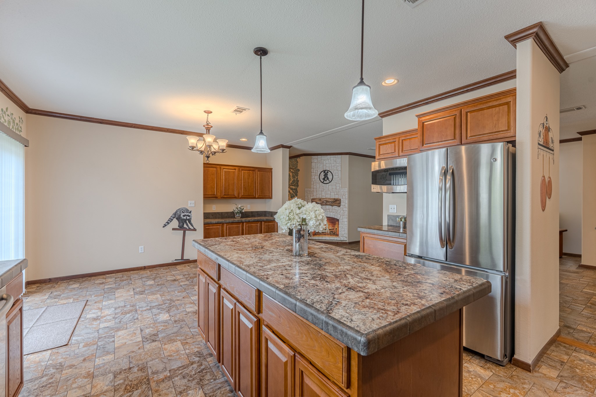 115 Canadian Drive Trinity, TX 75862 - Photo 13 of 41 Kitchen with island and open to the dining area.