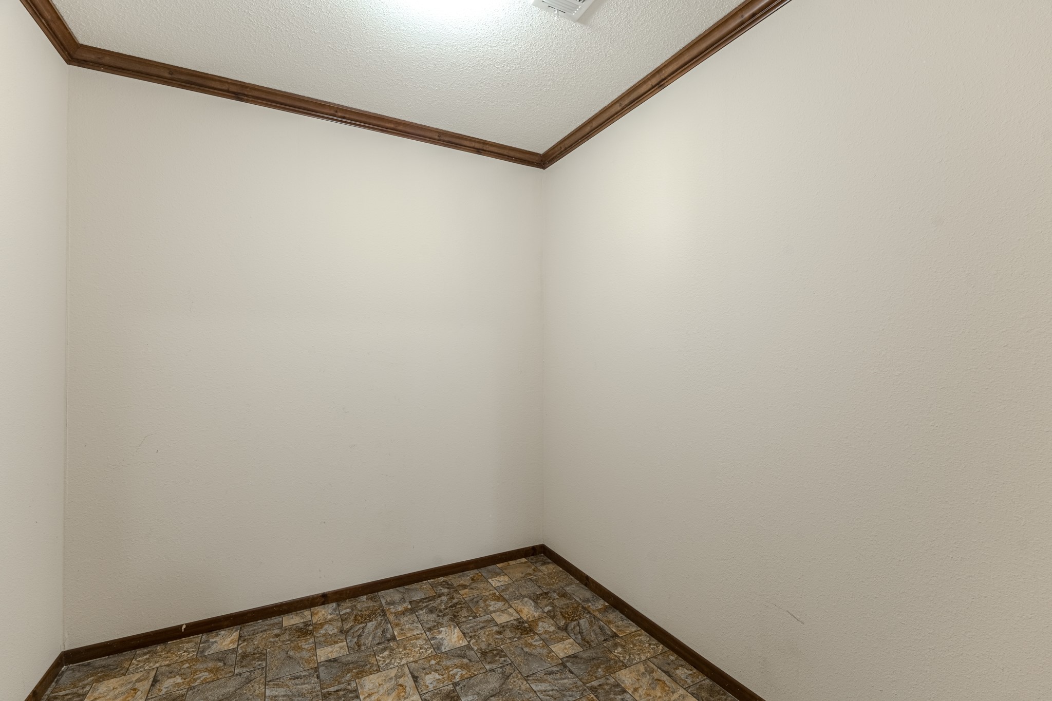 115 Canadian Drive Trinity, TX 75862 - Photo 22 of 41 This is a storage room or could be used as an office.