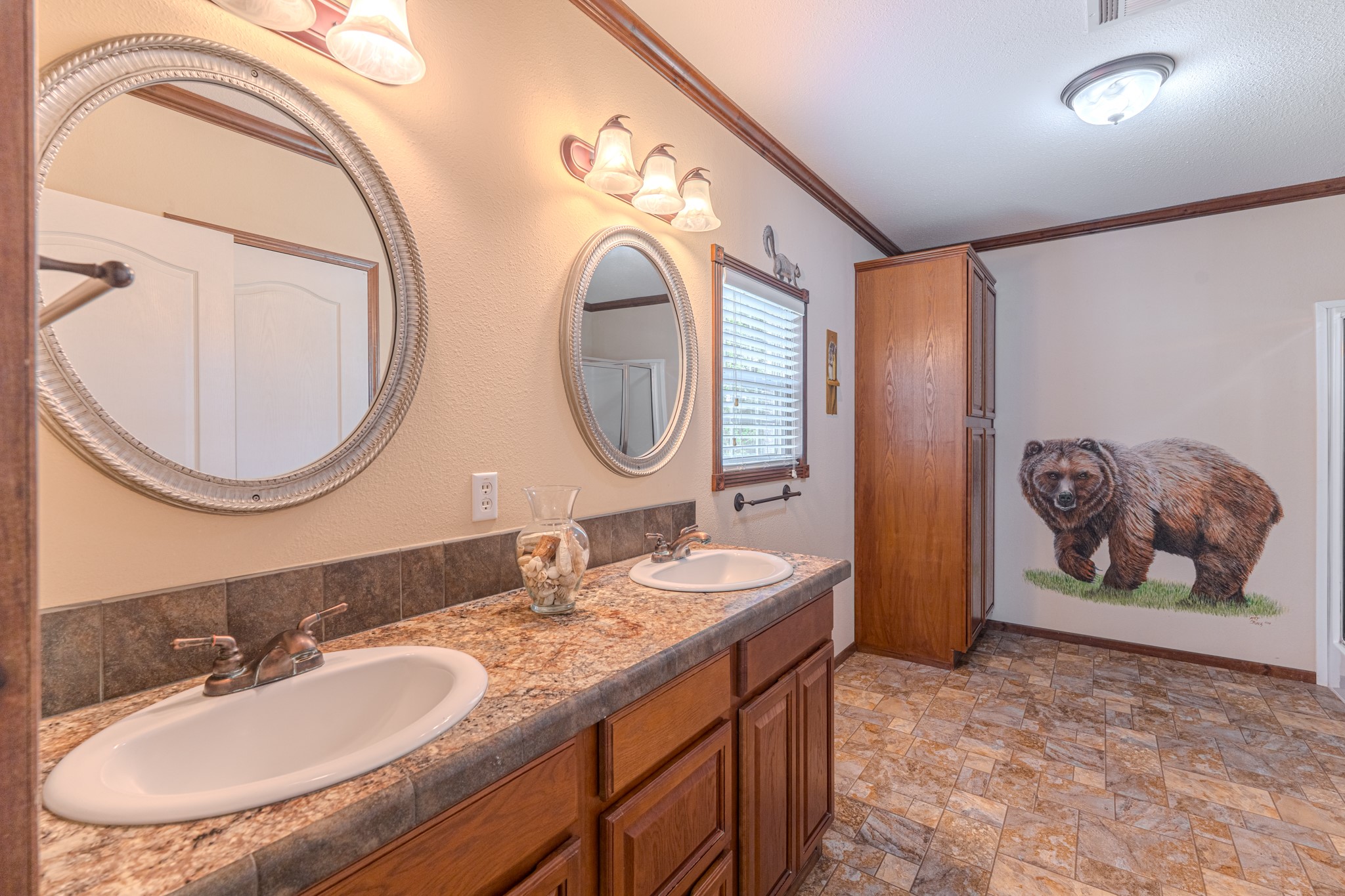 115 Canadian Drive Trinity, TX 75862 - Photo 27 of 41 Primary Bathroom with double sinks.
