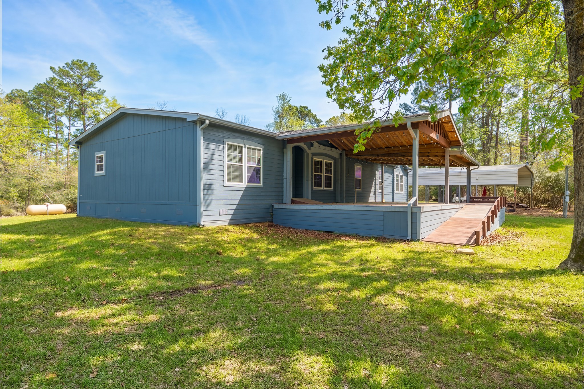 115 Canadian Drive Trinity, TX 75862 - Photo 5 of 41 View of ramp and huge covered porch.