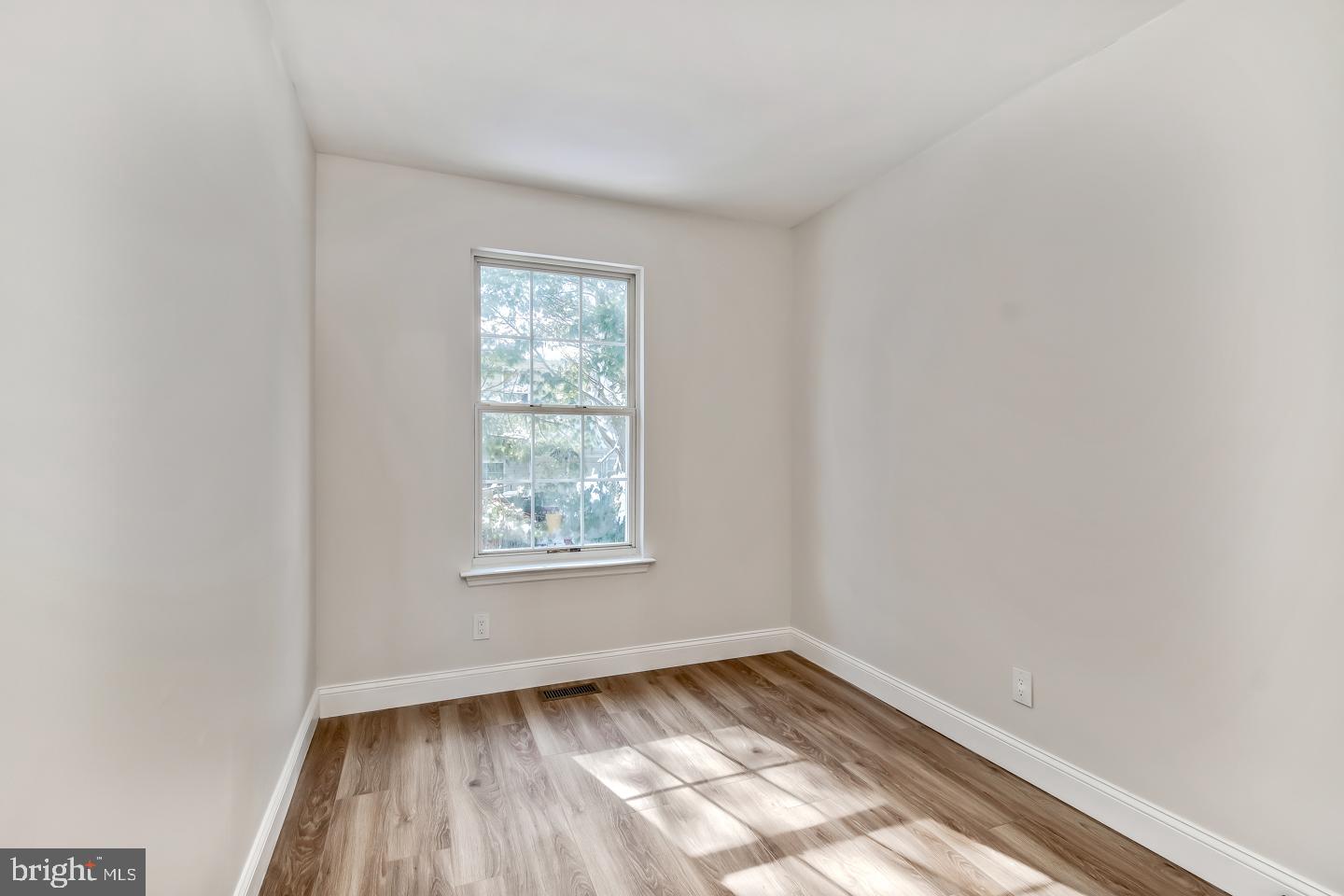 24 Mill Court Pine Hill, NJ 08021 - Photo 13 of 19 an empty room with a window