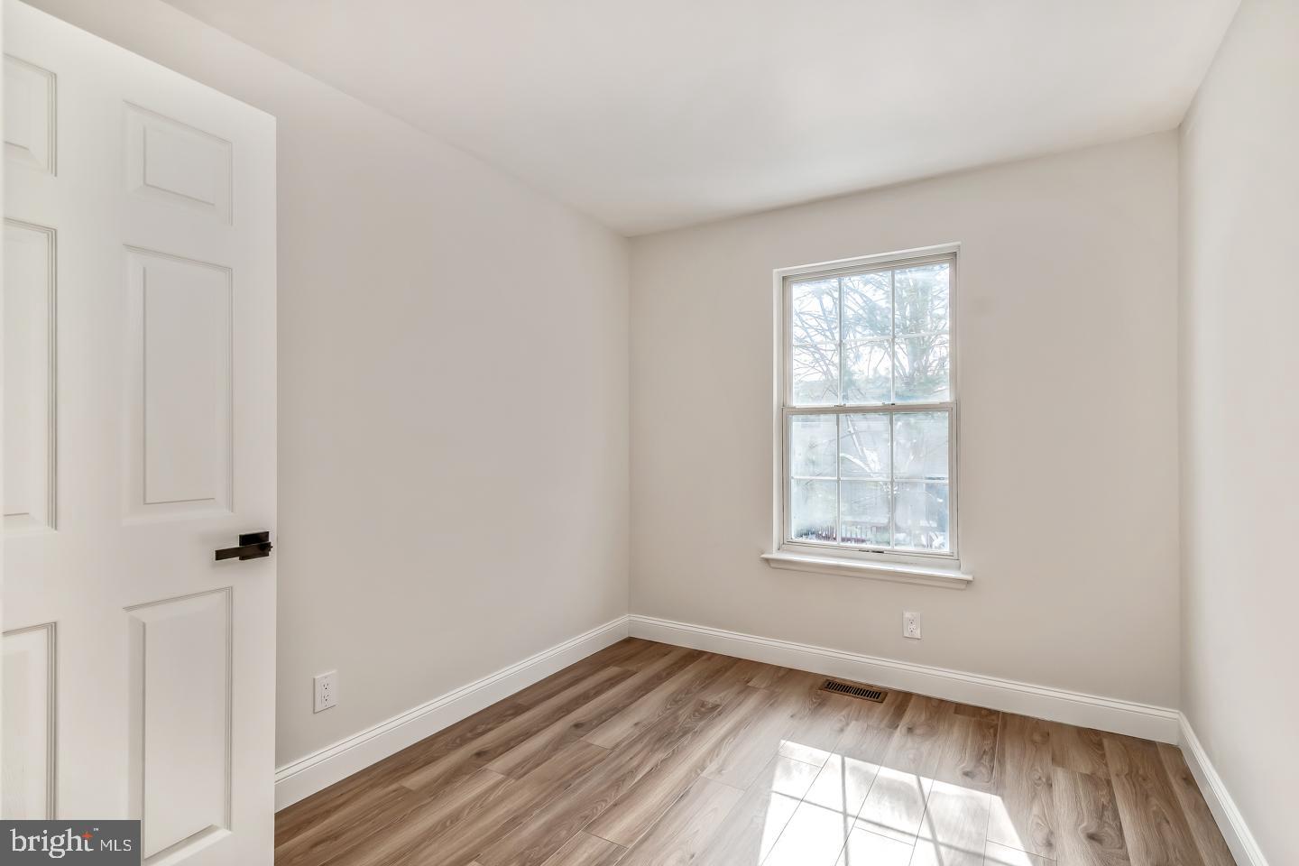 24 Mill Court Pine Hill, NJ 08021 - Photo 15 of 19 an empty room with a window