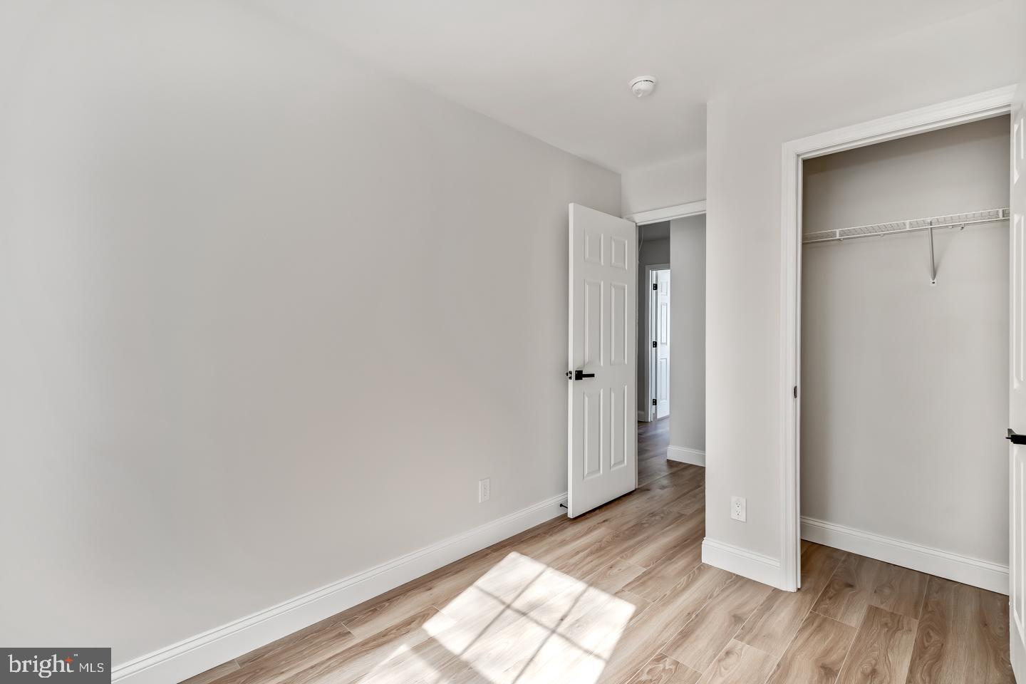 24 Mill Court Pine Hill, NJ 08021 - Photo 16 of 19 a view of hallway with wooden floor