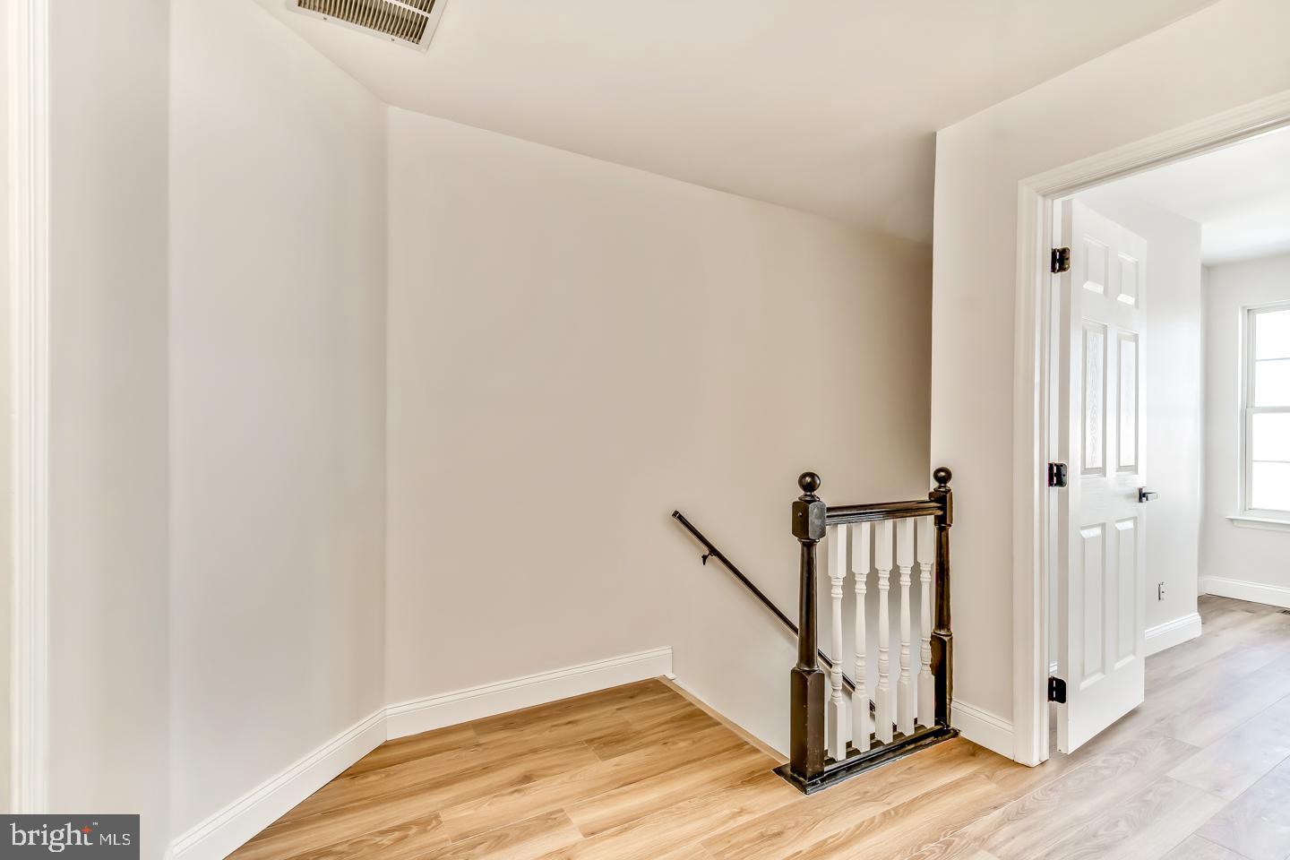 24 Mill Court Pine Hill, NJ 08021 - Photo 17 of 19 a view of a hallway with wooden floor and staircase