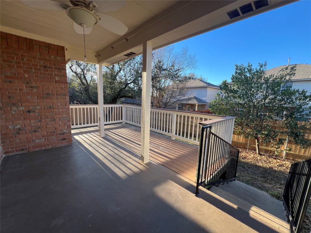 9301 Muskberry Cove Austin, TX 78717 - Photo 23 of 23 a view of a balcony with wooden floor