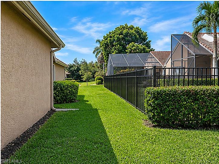 1654 Triangle Palm Terrace Naples, FL 34119 - Photo 2 of 4 Large side yard with plenty of privacy