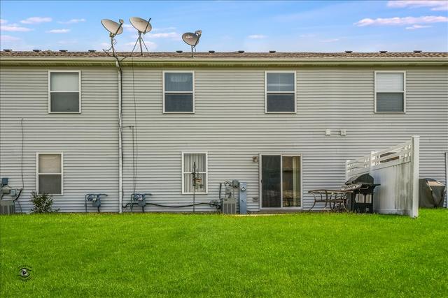 25216 Faraday Road Manhattan, IL 60442 - Photo 22 of 23 a front view of a house with garden