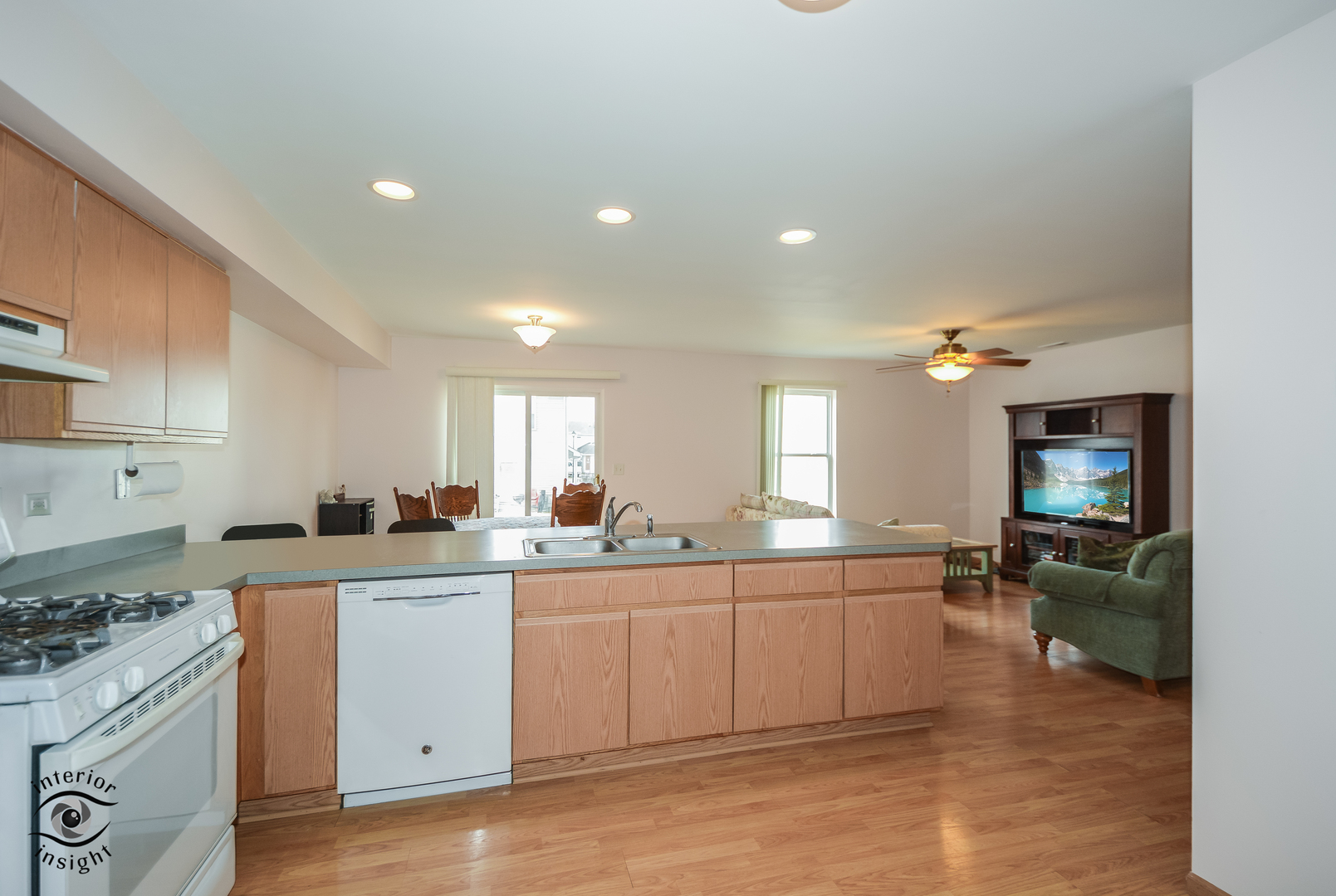 25216 Faraday Road Manhattan, IL 60442 - Photo 5 of 23 a kitchen with lots of counter top space sink and appliances