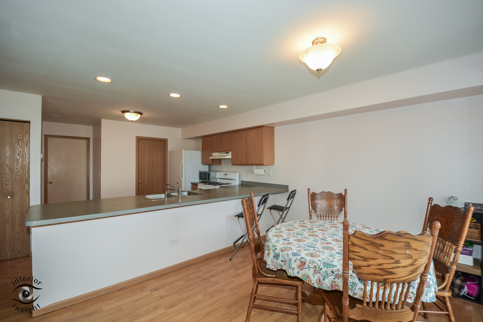 25216 Faraday Road Manhattan, IL 60442 - Photo 7 of 23 a dining room with furniture and wooden floor