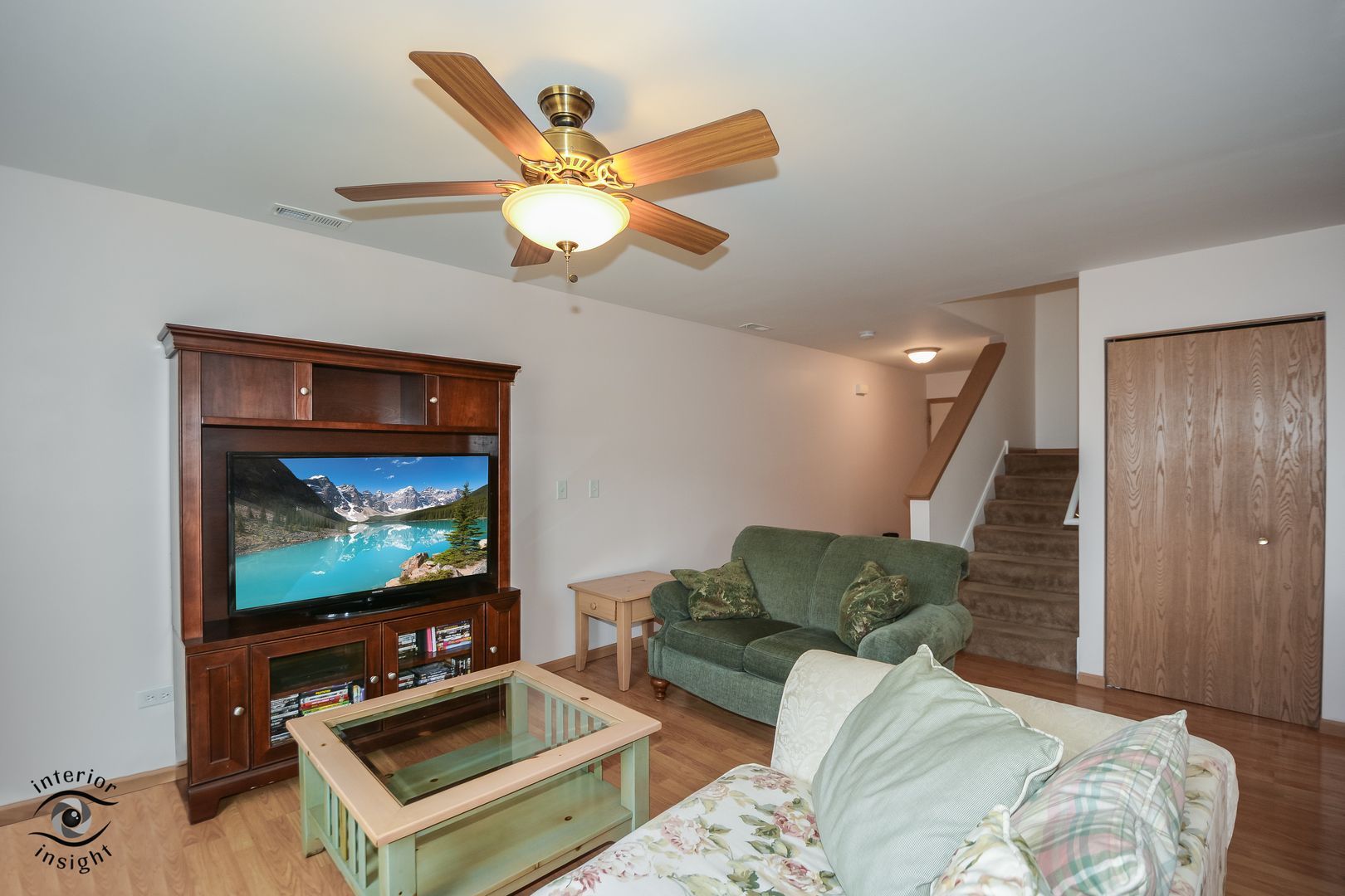 25216 Faraday Road Manhattan, IL 60442 - Photo 9 of 23 a living room with furniture a flat screen tv and a window
