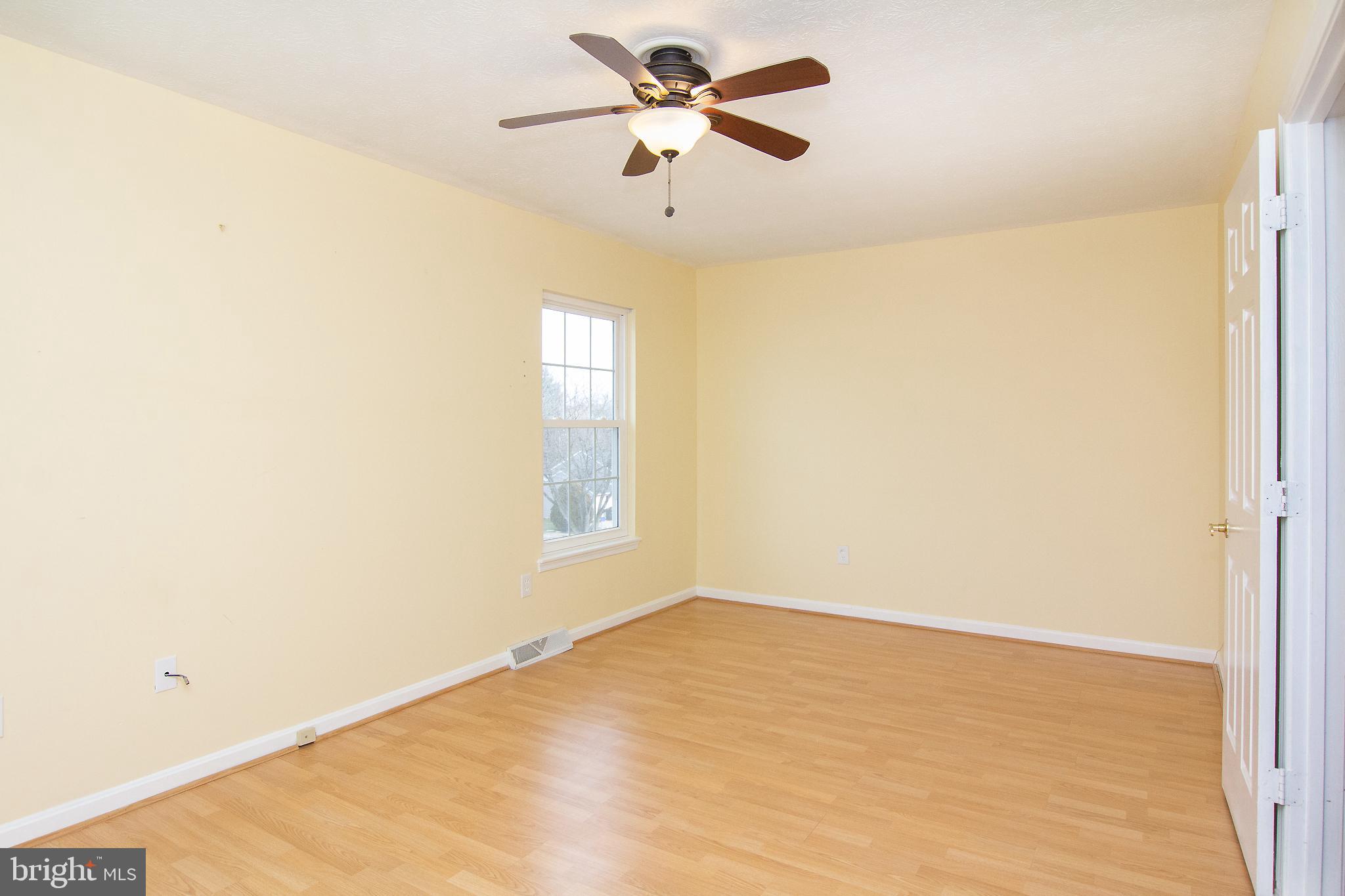 840 Century Street Hampstead, MD 21074 - Photo 24 of 34 a view of an empty room with a window