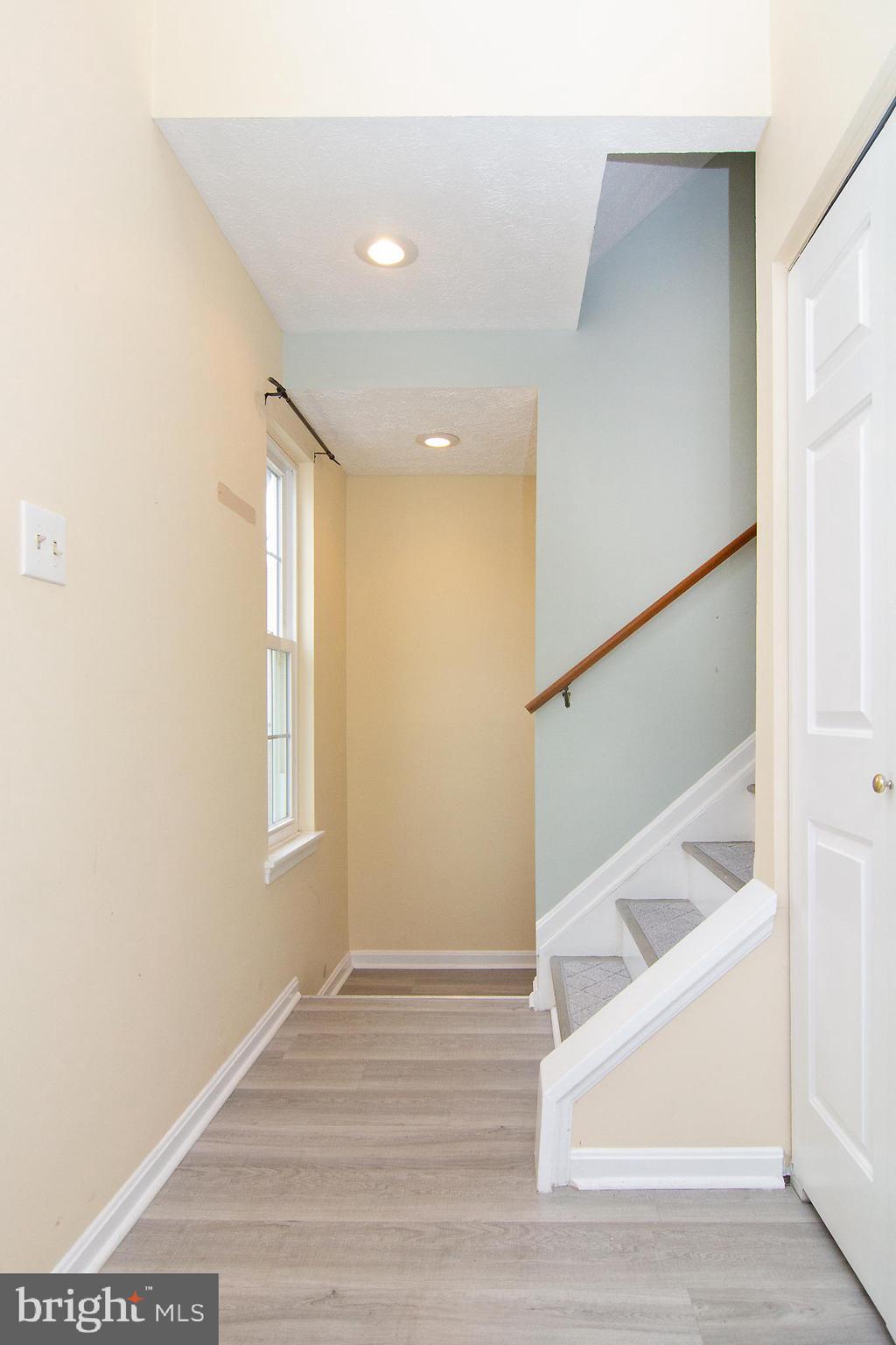 840 Century Street Hampstead, MD 21074 - Photo 4 of 34 a view of entryway and hall with wooden floor