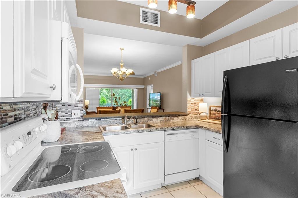 5470 16th Place Southwest, Unit 101 Naples, FL 34116 - Photo 2 of 17
