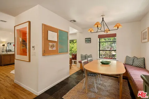 a kitchen with stainless steel appliances granite countertop a stove and a sink