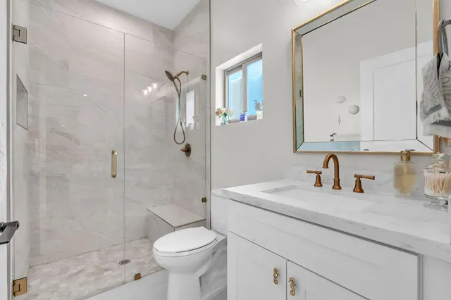 a bedroom with a bed and furniture