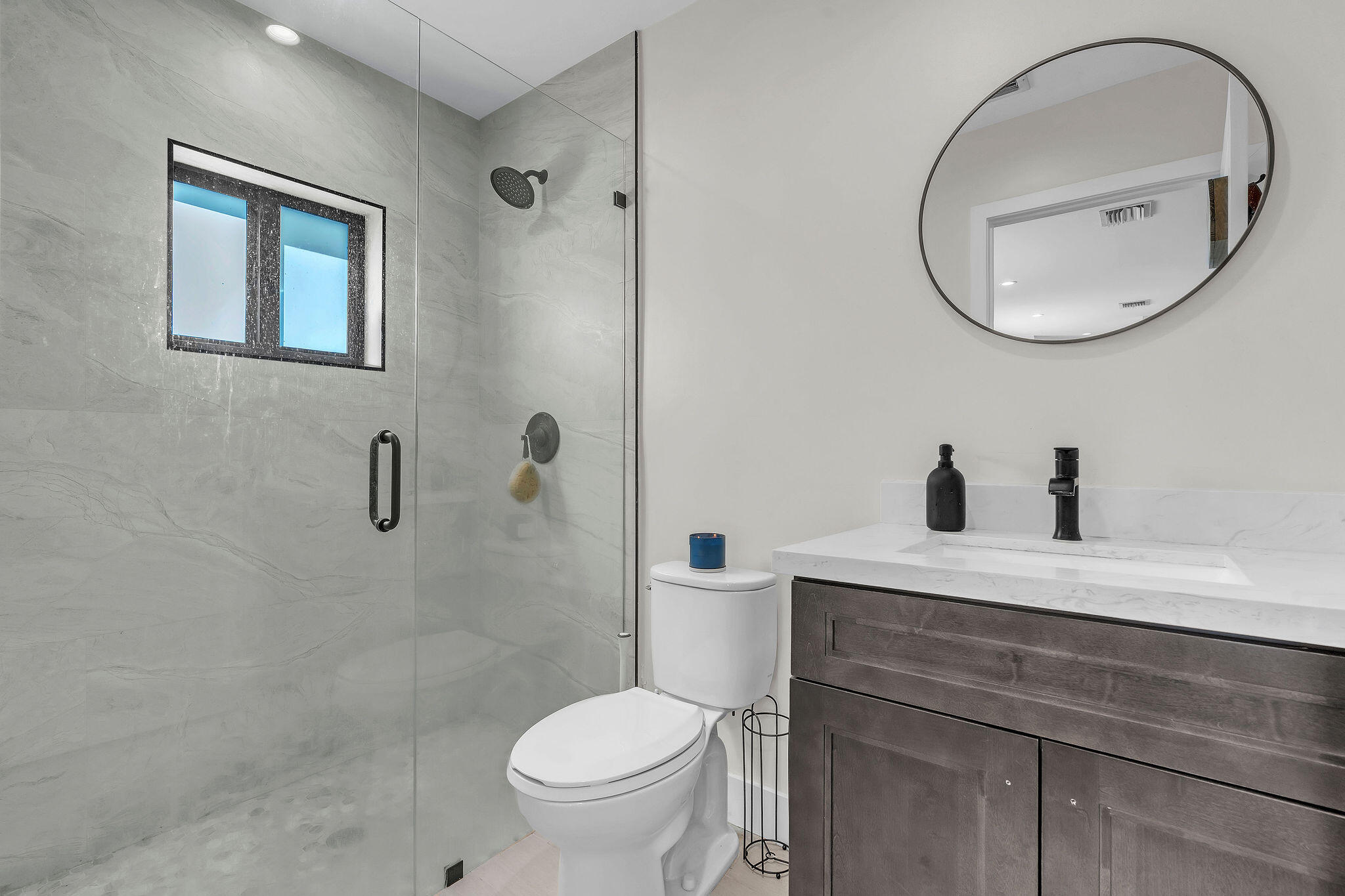 247 Hispanola Road Tavernier, FL 33070 - Photo 28 of 39 a bathroom with a sink a toilet and a mirror