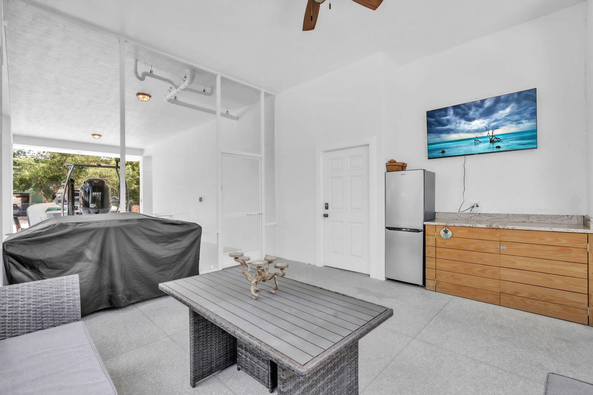 247 Hispanola Road Tavernier, FL 33070 - Photo 29 of 39 a living room with furniture and a table