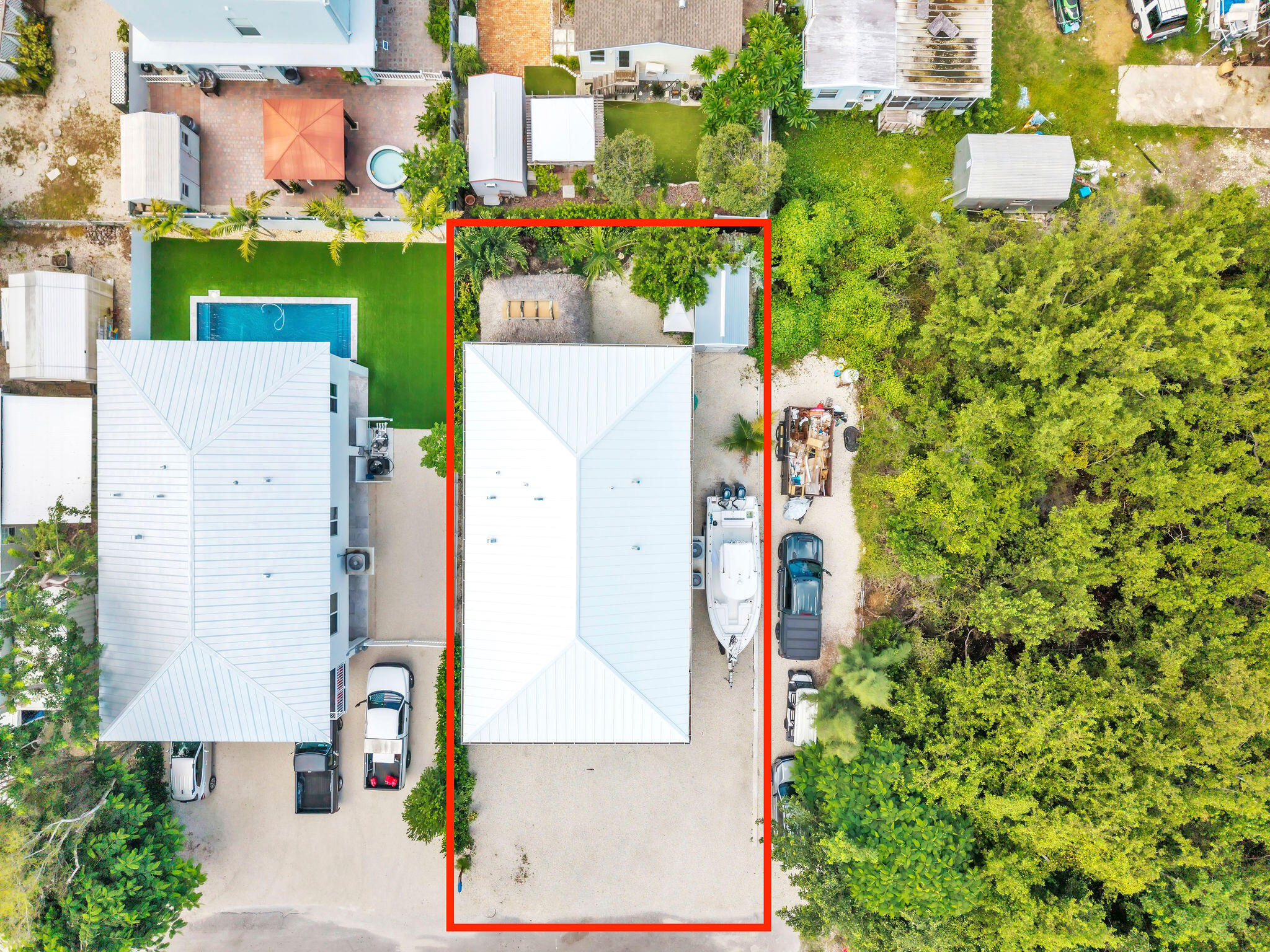 247 Hispanola Road Tavernier, FL 33070 - Photo 5 of 39 an aerial view of a house with a yard and garden