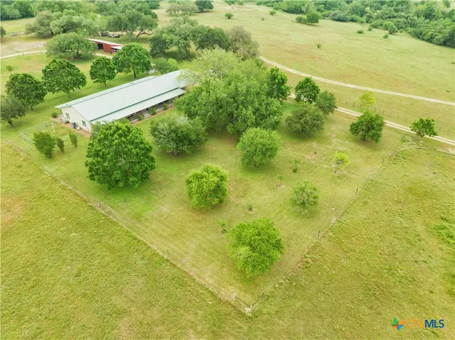 a view of a yard with an outdoor space