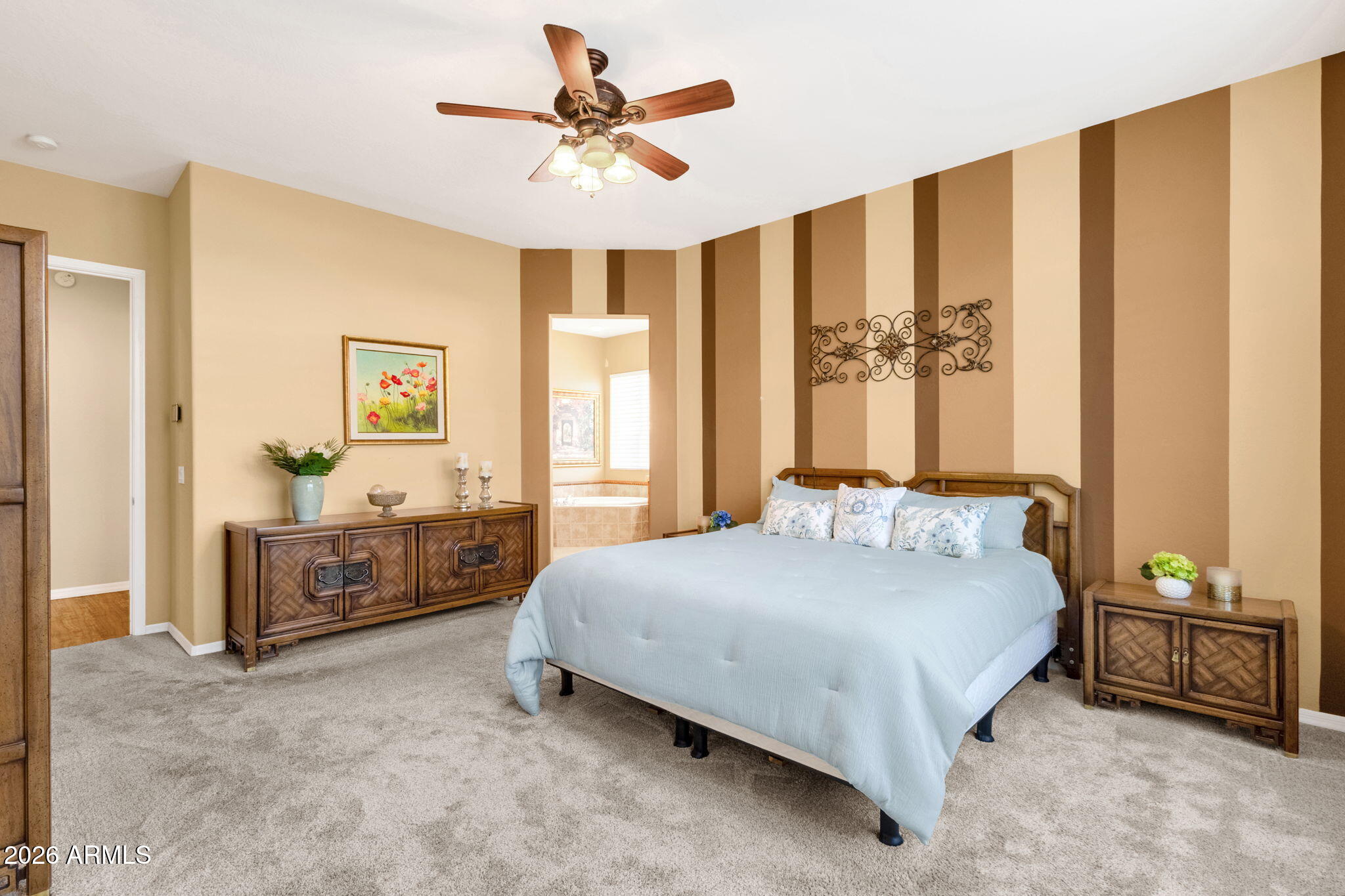 4734 East Indigo Street Gilbert, AZ 85298 - Photo 20 of 32 a bedroom with a bed and a chandelier