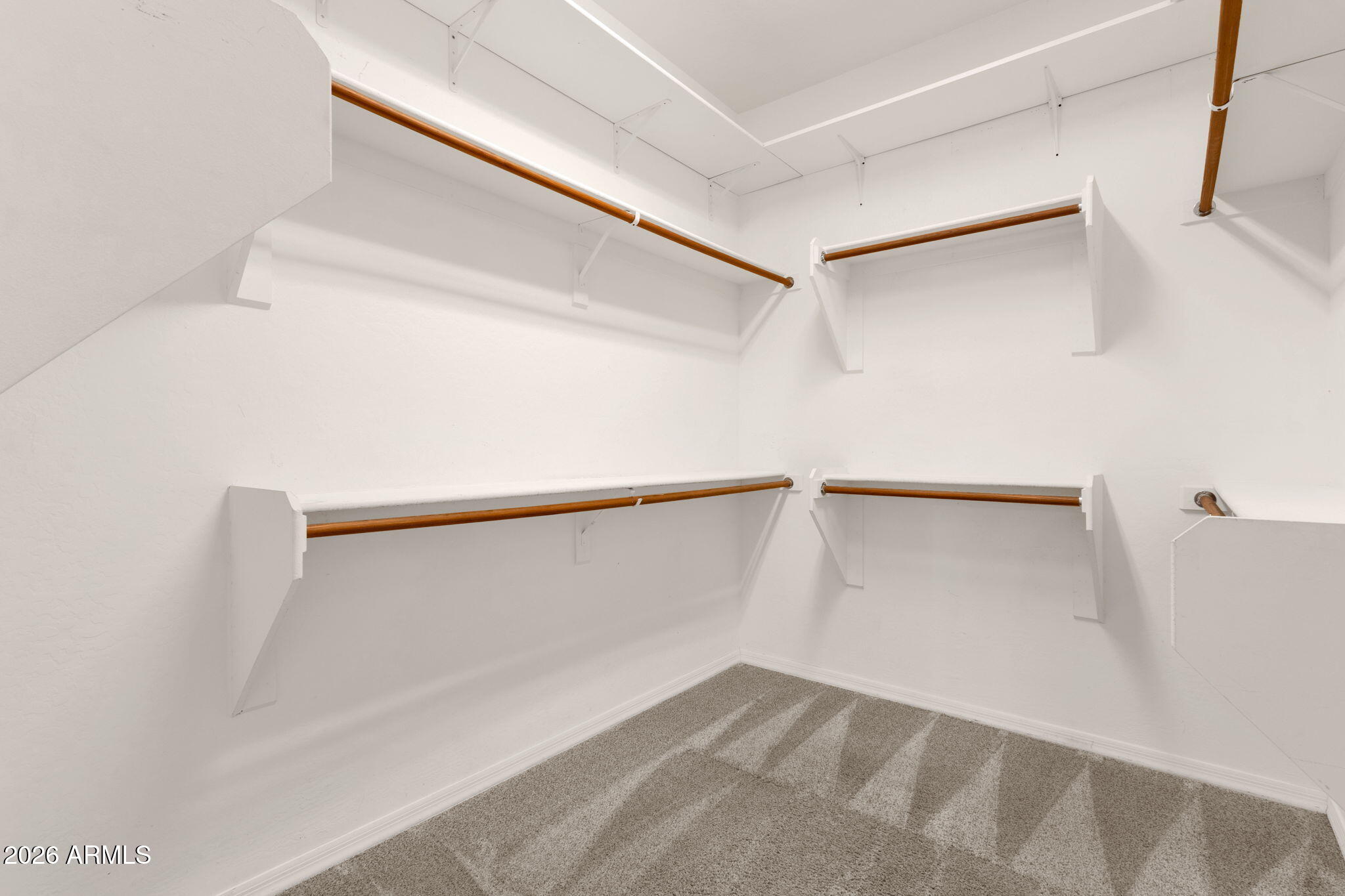 4734 East Indigo Street Gilbert, AZ 85298 - Photo 23 of 32 a view of an empty walk in closet