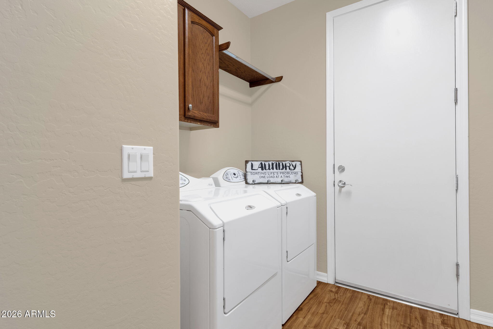 4734 East Indigo Street Gilbert, AZ 85298 - Photo 27 of 32 a utility room with a sink a mirror and vanity