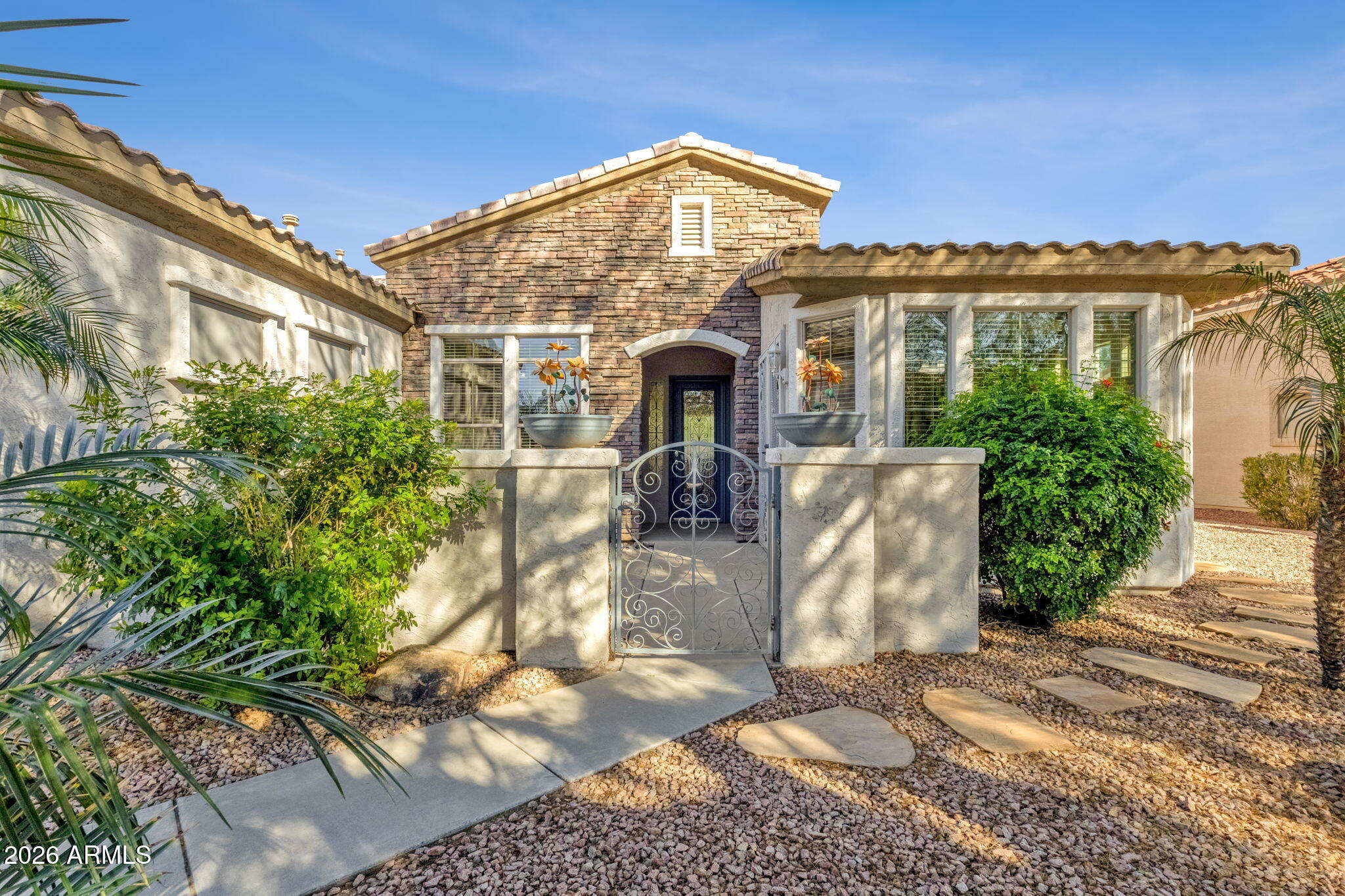 4734 East Indigo Street Gilbert, AZ 85298 - Photo 3 of 32 a front view of a building