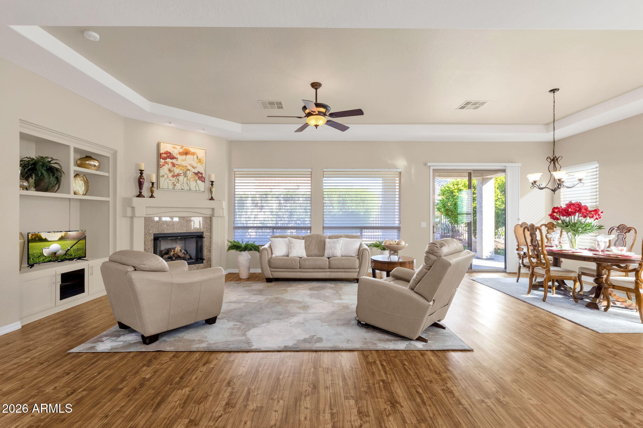 4734 East Indigo Street Gilbert, AZ 85298 - Photo 9 of 32 a living room with furniture and a fireplace