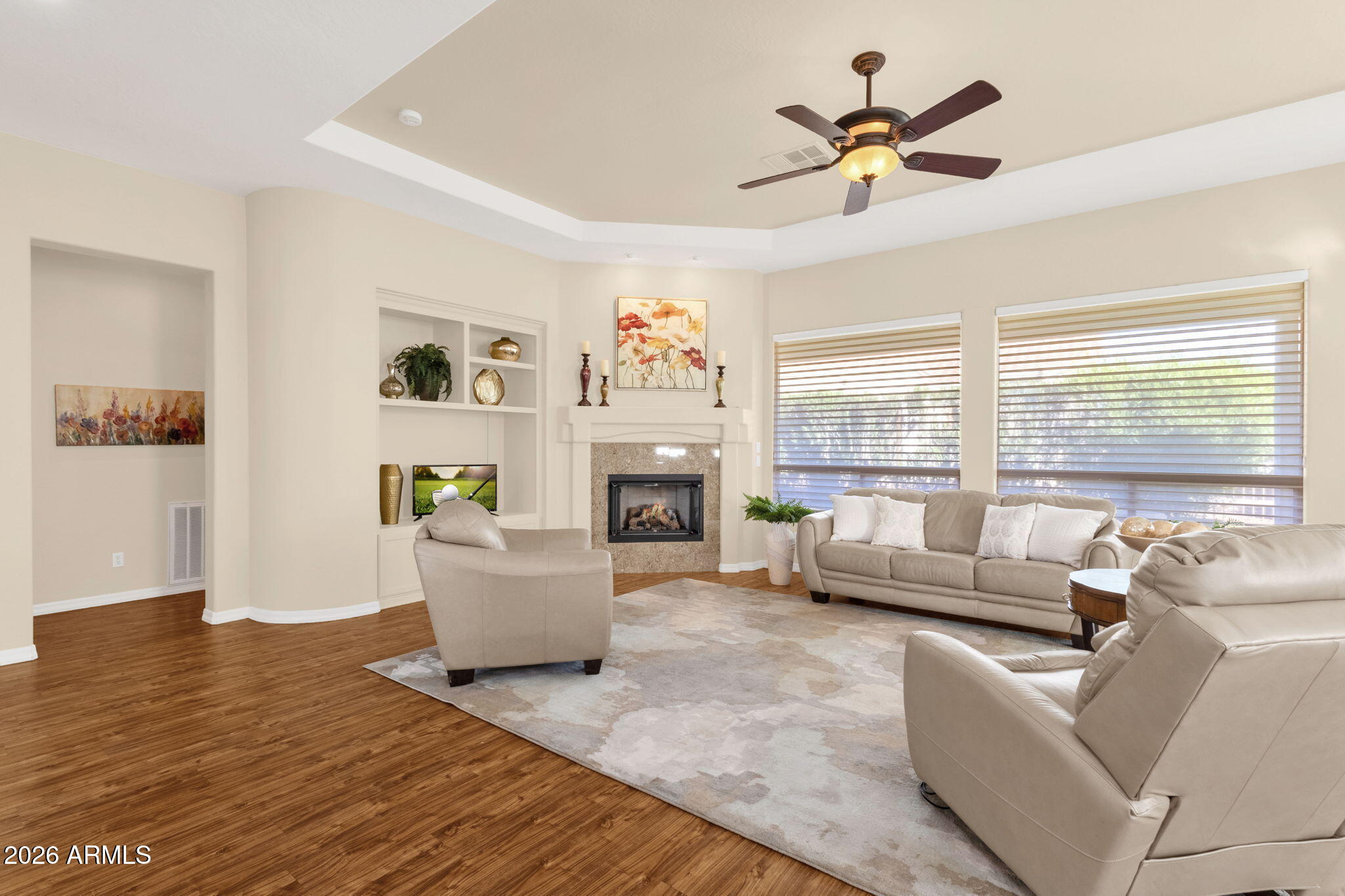 4734 East Indigo Street Gilbert, AZ 85298 - Photo 10 of 32 a living room with furniture fireplace and a large window