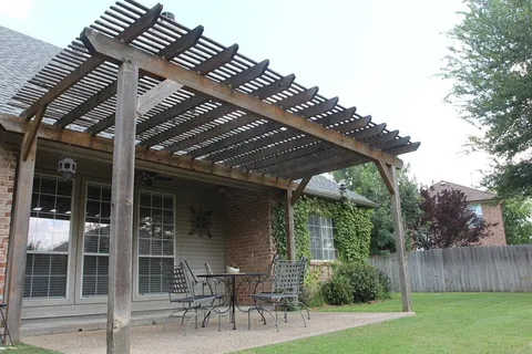 a patio with wooden fence