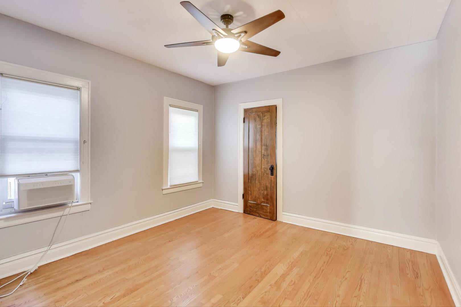1020 Harvard Terrace Evanston, IL 60202 - Photo 14 of 31 a view of an empty room with a window and closet