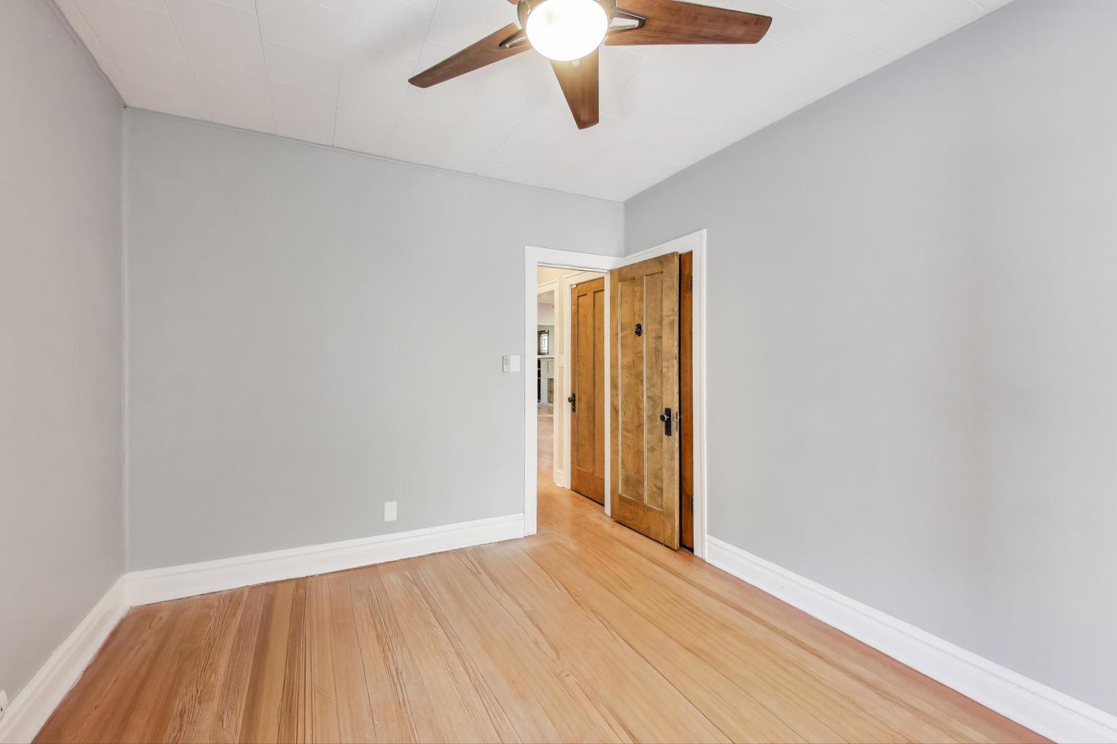 1020 Harvard Terrace Evanston, IL 60202 - Photo 17 of 31 a view of an empty room with wooden floor