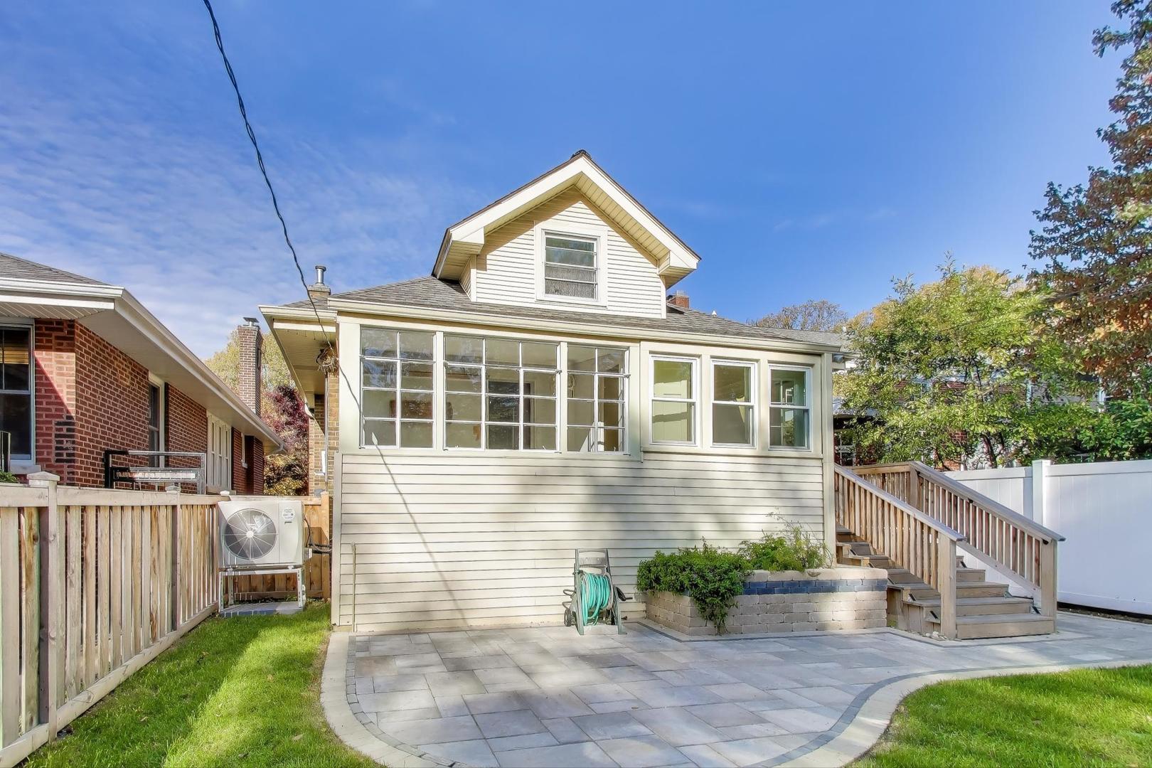 1020 Harvard Terrace Evanston, IL 60202 - Photo 24 of 31 a front view of a house with a yard