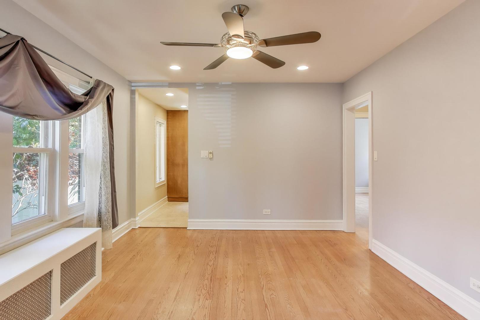 1020 Harvard Terrace Evanston, IL 60202 - Photo 7 of 31 a view of an empty room with a window