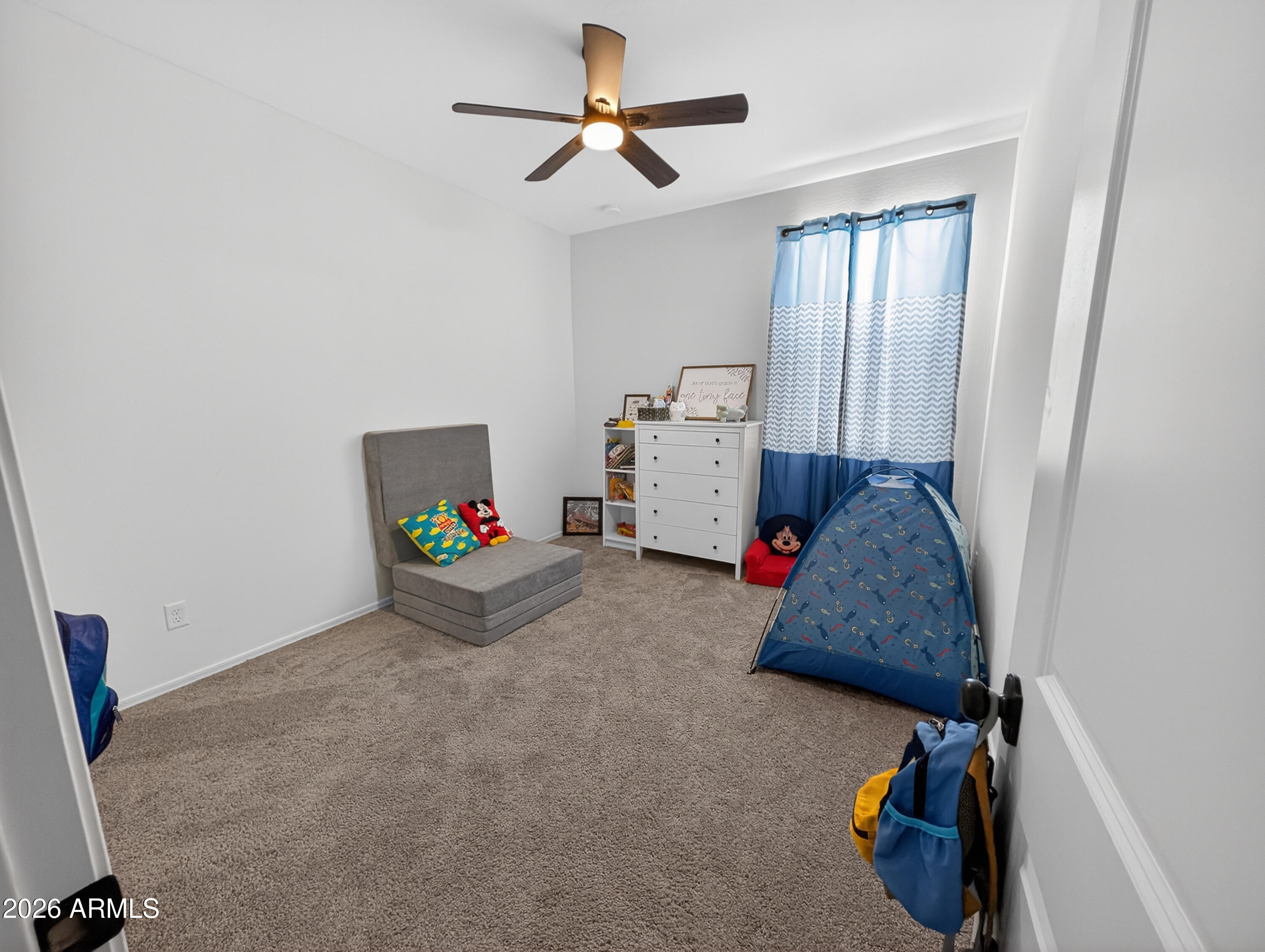 2439 West Pecan Road Phoenix, AZ 85041 - Photo 11 of 38 a living room with furniture and a window