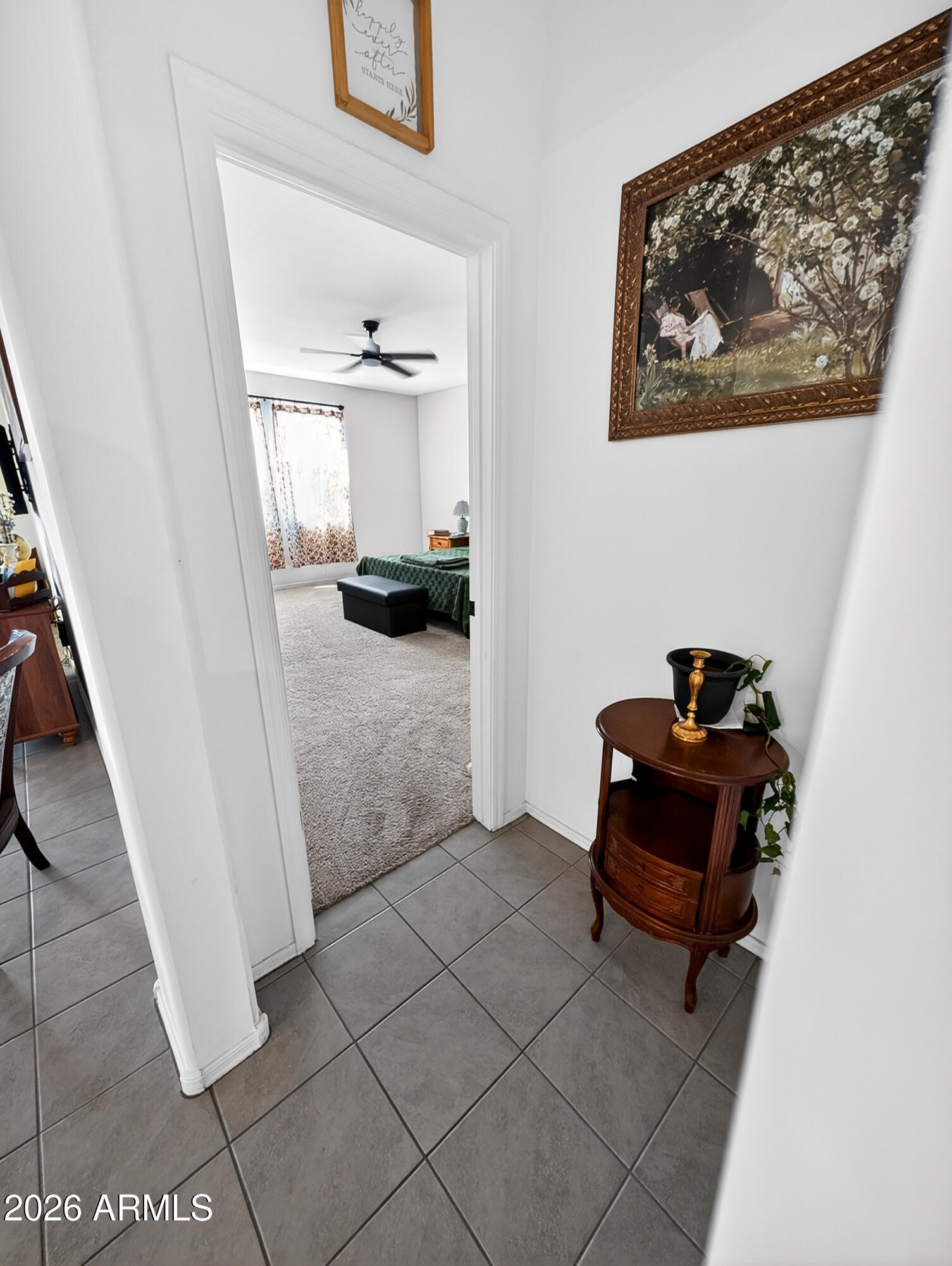 2439 West Pecan Road Phoenix, AZ 85041 - Photo 13 of 38 a view of a hallway with workspace and a window